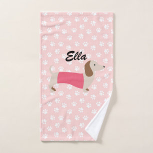 Cadeau rose et blanc de serviette de teckel