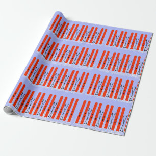Cadeau Skis rouges avec papier d'emballage violet