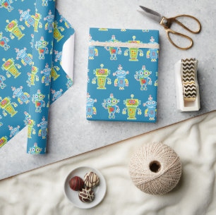 Cadeau Trois robots colorés emballant du papier