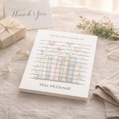 Cadeaubloemen voor leraren in een stapel boeken notitieblok