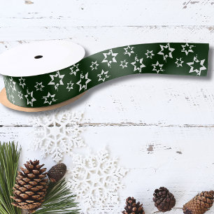 Cadeauverpakking witte sterren groen lint