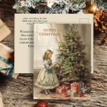 Cadeaux Vintage Christmas Tree Girls<br><div class="desc">Carte postale de voeux de Noël avec un tableau vintage d'une fille décorant un arbre de Noël avec des cadeaux emballés en dessous. Texte dit, "Joyeux Noël" mais est personnalisable pour votre propre salutation. Personnalisé au dos avec votre message, ainsi que votre nom et votre adresse de retour. Contactez-moi pour...</div>