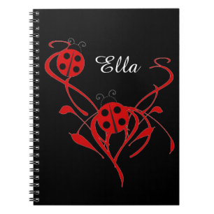 Cahier à motif floral rouge avec monogramme coccin