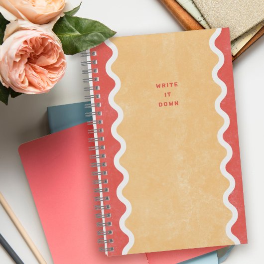 Cahier à spirale avec lignes ondulées orange rouge