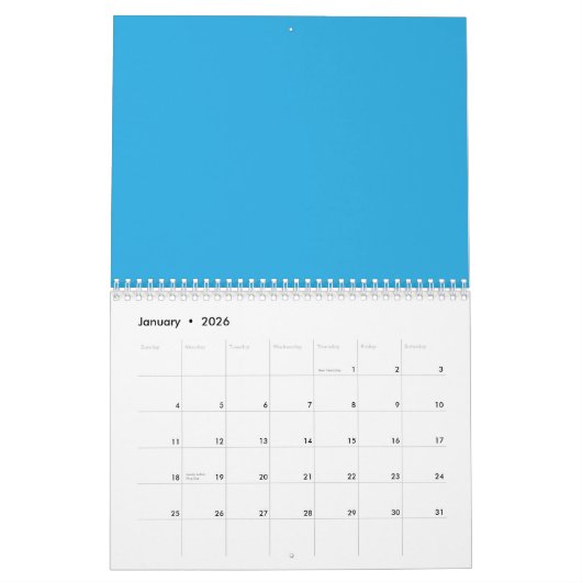 Calendrier fond bleu avec chat noir et blanc sur (Jan 2026)