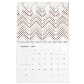 Calendrier un arrière - plan blanc aux points brun et rouge (Feb 2027)