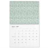 Calendrier un arrière - plan vert et blanc avec de petits feu (Mar 2027)
