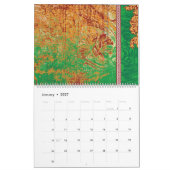 Calendrier un tableau d'un champ vert avec une bordure orange (Jan 2027)
