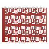 Calendrier Un tapis rouge avec un motif texturé est étalé sur (Protection)