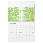 Calendrier Une femme portant un pull gris et des lunettes est (Mar 2027)