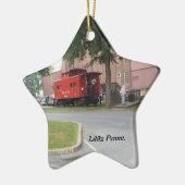 Cambuse rouge en ornement de Noël de penne de (Gauche)