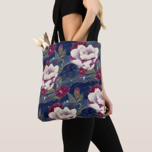 Camelia's op donkerblauw draagtas