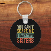 Can' t schrik me ik heb twee zussen grappige b sleutelhanger (Voorkant)