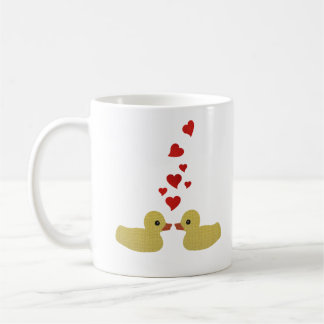 Canards dans la tasse d'amour