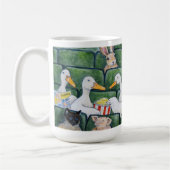 Canards Dans Une Mug De Rangée (Gauche)