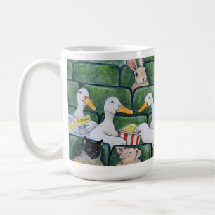 Canards Dans Une Mug De Rangée