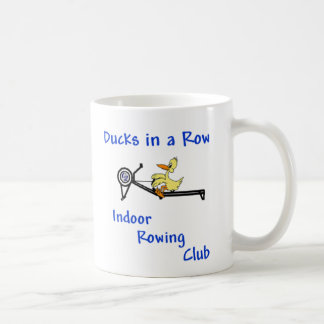 Canards dans une tasse de rangée