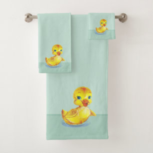 Canards nageurs mignons sur serviette de bain bleu