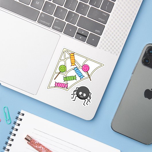 Candy Catcher Spider Sticker (Laptop met iPhone)