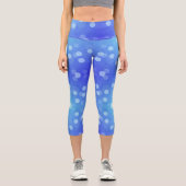 Capri A person wearing vibrant blue leggings adorned  (Recto)