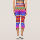 Capri A woman wears vibrant, zigzag-patterned leggings  (Verso)