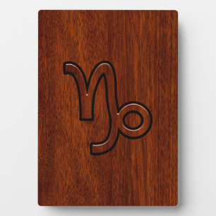 Capricorn Zodiac Symbol in Mahogany Wood Style Fotoplaat