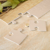 Carlin chiots parmi les puzzle de fleurs (Côté)