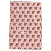 Carlin mignon dans des sacs cadeaux de beigne (Dos)