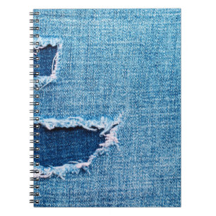 Carnet Arrière - plan de denim texturé. Trou déchiré dans