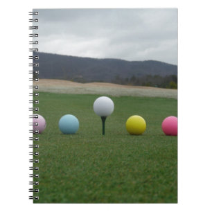 Carnet Ballons de golf aux couleurs vives sur une montagn