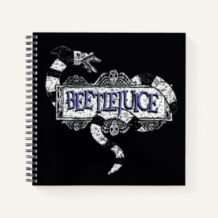 Carnet Beetlejus Vapeur de sable enroulé sur le logo B
