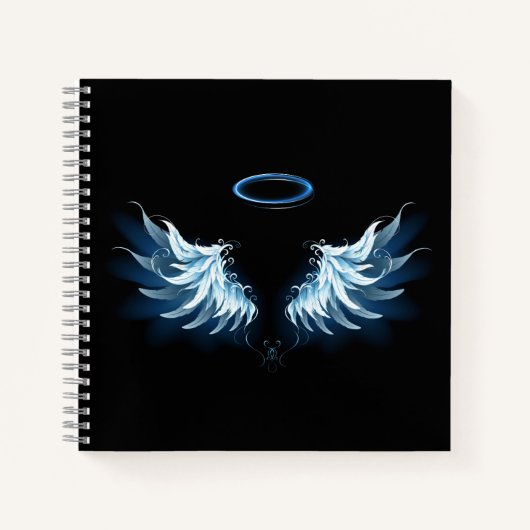 Carnet Blue Glowing Angel Wings on black background (Devant)
