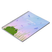 Carnet caricature grenouille regarder sur l'herbe dragonf (Côté gauche)