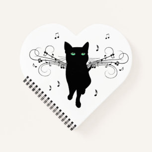 Carnet Chat noir entouré de notes de musique chuchotantes