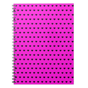 Carnet Coeurs noirs sur un ordinateur portable rose clign