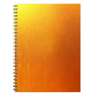 Carnet Couleur or ou feuille sur le mur texture arrière -