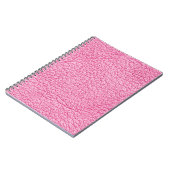 Carnet Cuir rose gros plan, arrière - plan texturé. (Côté gauche)