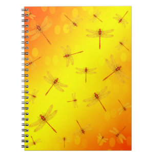 Carnet Des libellules jaunes dorées volent,