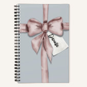 Carnet Enveloppé dans un arc rose (Recto)