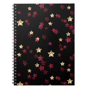 Carnet étoiles d'or et de rouge.