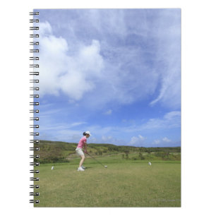 Carnet Femme jouant au golf