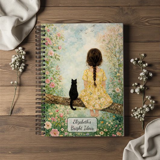 Carnet Fille et chat dans un jardin printanier