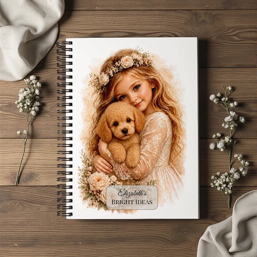Carnet Fille serrant un chiot Caniche dans ses bras