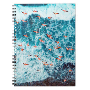 Carnet Flamants roses volant sur la plage de la mer des C