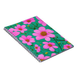 Carnet fleurs roses sur arrière - plan vert