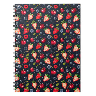 Carnet Fraises et cerises sur un arrière - plan sombre