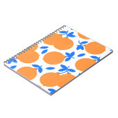 Carnet Fruit orange : Motif exquis bleu-bracelet. (Côté gauche)