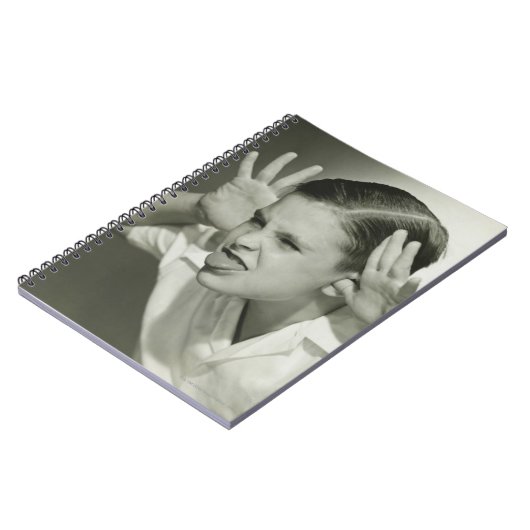 Carnet Garçon faisant le visage (Côté gauche)