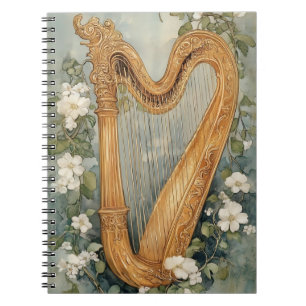 Carnet harpe ornementale entourée de fleurs blanches