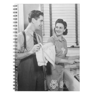 Carnet Homme et femme faisant des plats